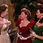 Judy Garland, June Lockhart, and Lucille Bremer in Meet Me in St. Louis (1944)