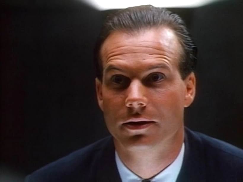 Bill Paxton in Brain Dead (1990)