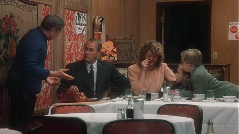 Peter Billingsley, Melinda Dillon, Darren McGavin, Ian Petrella, and John Wong in A Christmas Story (1983)