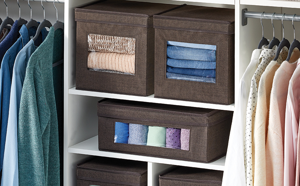 brown fabric storage totes with view window, lid on white shelves, tops on hangers in closet setting