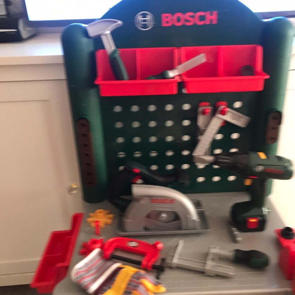 Workbench and Bosch tools as pictured would make perfect Christmas present some of tools battery operated(bought extras) work bench comes with original tools as well as separately brought Bosch battery tools