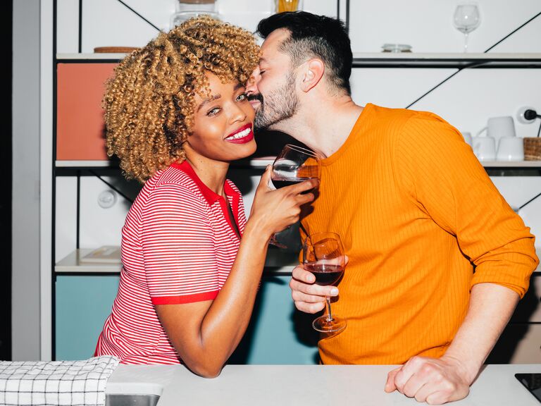 Cute Couple Poses: Man kissing woman on the cheek