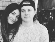 Black and white photograph of Joe Burrow and GIrlfriend Olivia Holzmacher.