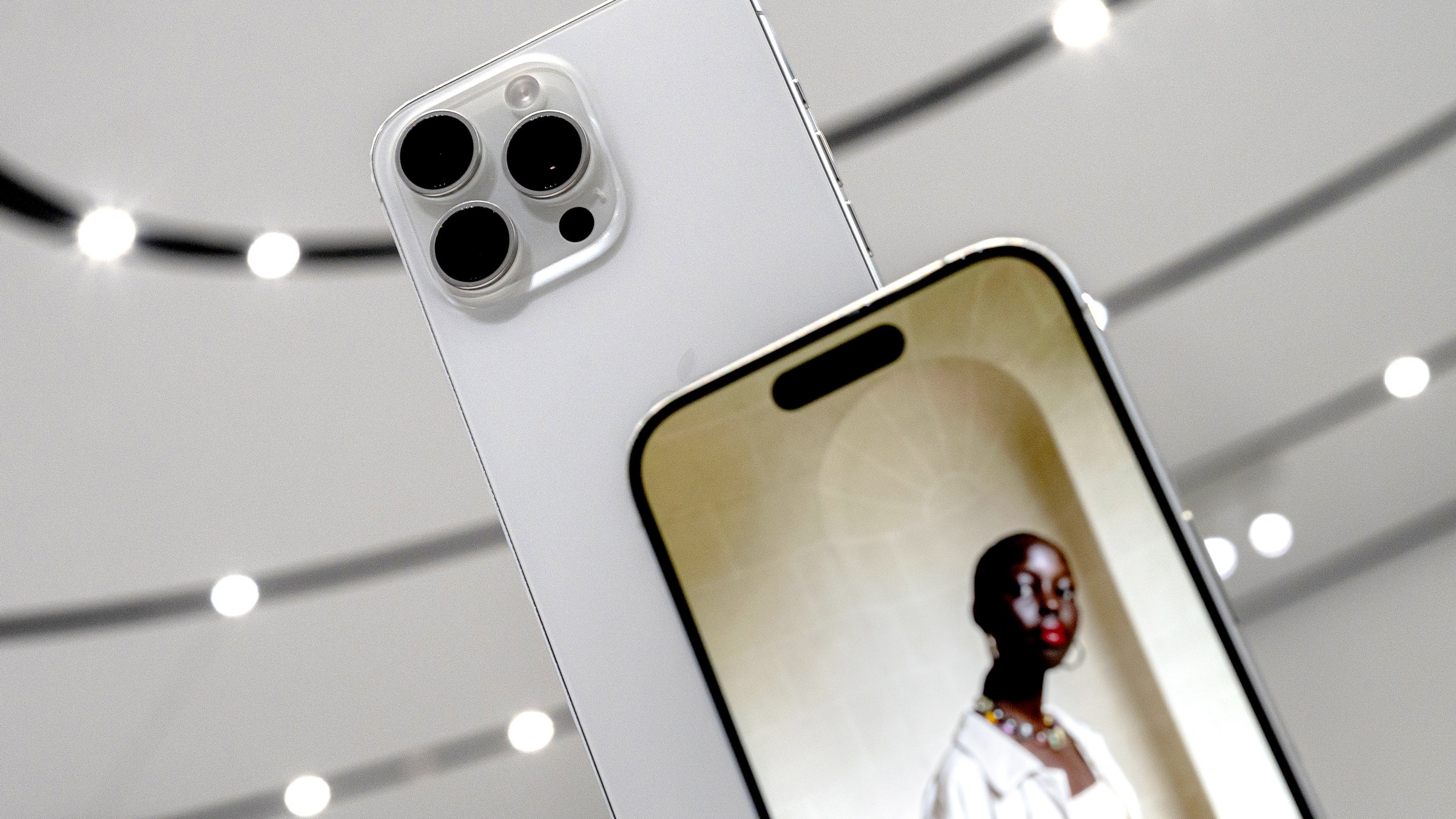 Apple iPhone 15 Pro Max smartphones displayed during an event at Apple Park campus in Cupertino California