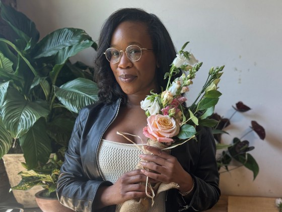 Woman holding bouquet.