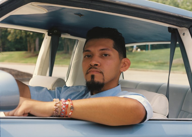 Image: Alfredo Corona in his car at Rhodes Jordan Park in Lawrenceville, Ga., on Sept 10.