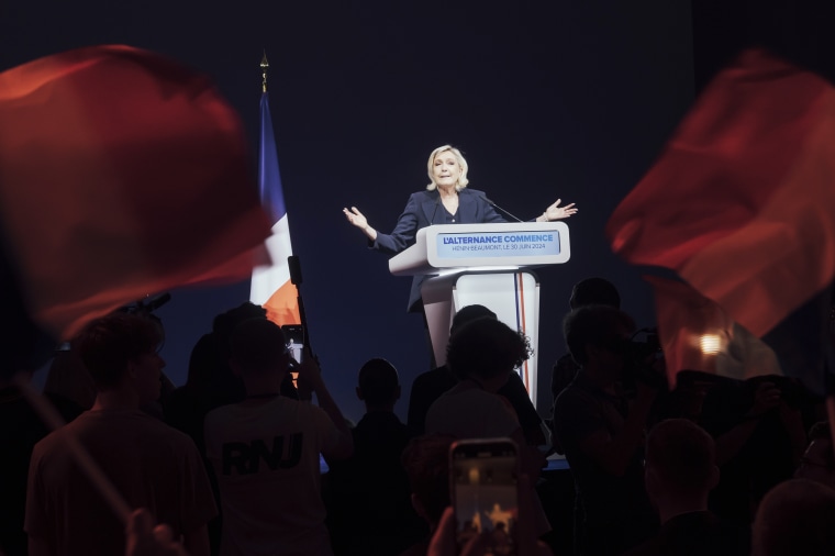 Le Pen's National Rally was on track to dominate the first round of France's legislative election, dealing a major blow to President Emmanuel Macron and setting the stage for a far-right party to control the country's government for the first time in its modern history. 