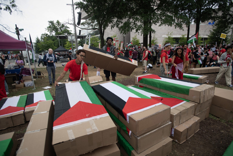 Pro-Palestinian demonstrators prepare cardboard coffins a for a protest before Israeli Prime Minister Benjamin Netanyahu addresses a joint meeting of Congress on July 24, 2024