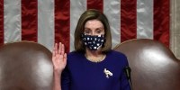 Nancy Pelosi raising her arm