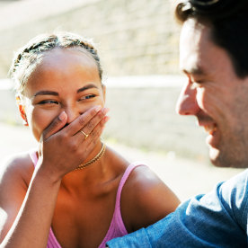 Two friends laughing