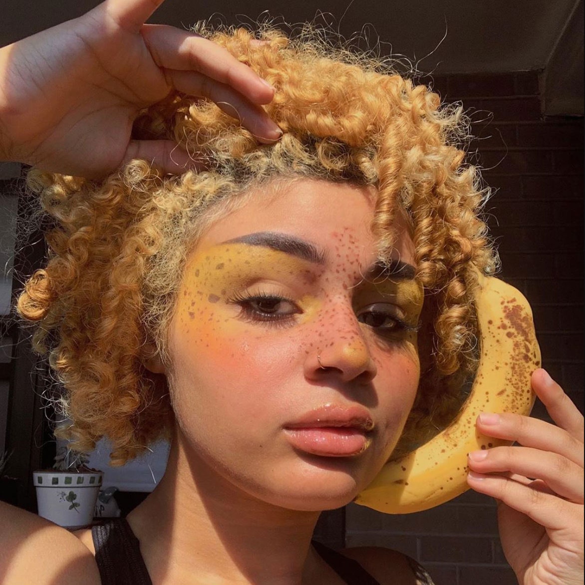 Woman wearing banana makeup