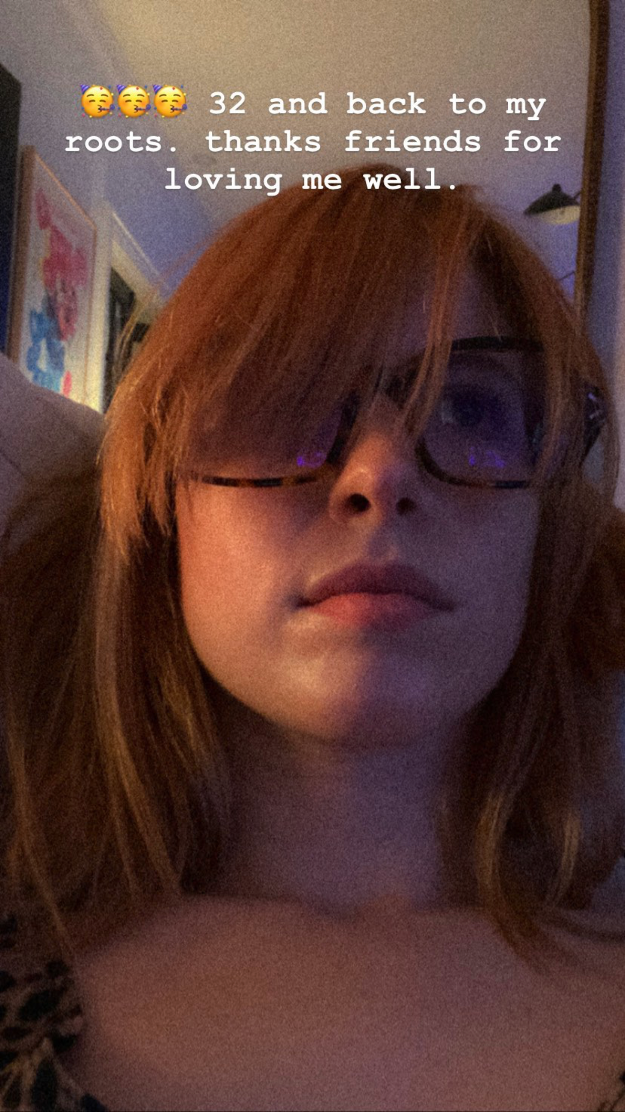 Selfie of Hayley Williams with glasses and orange hair