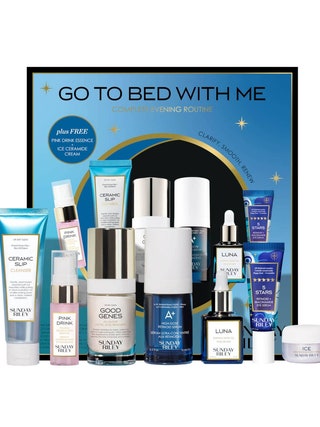 Sunday Riley Go to Bed With Me Complete Evening Routine seven skincare products and blue box on white background