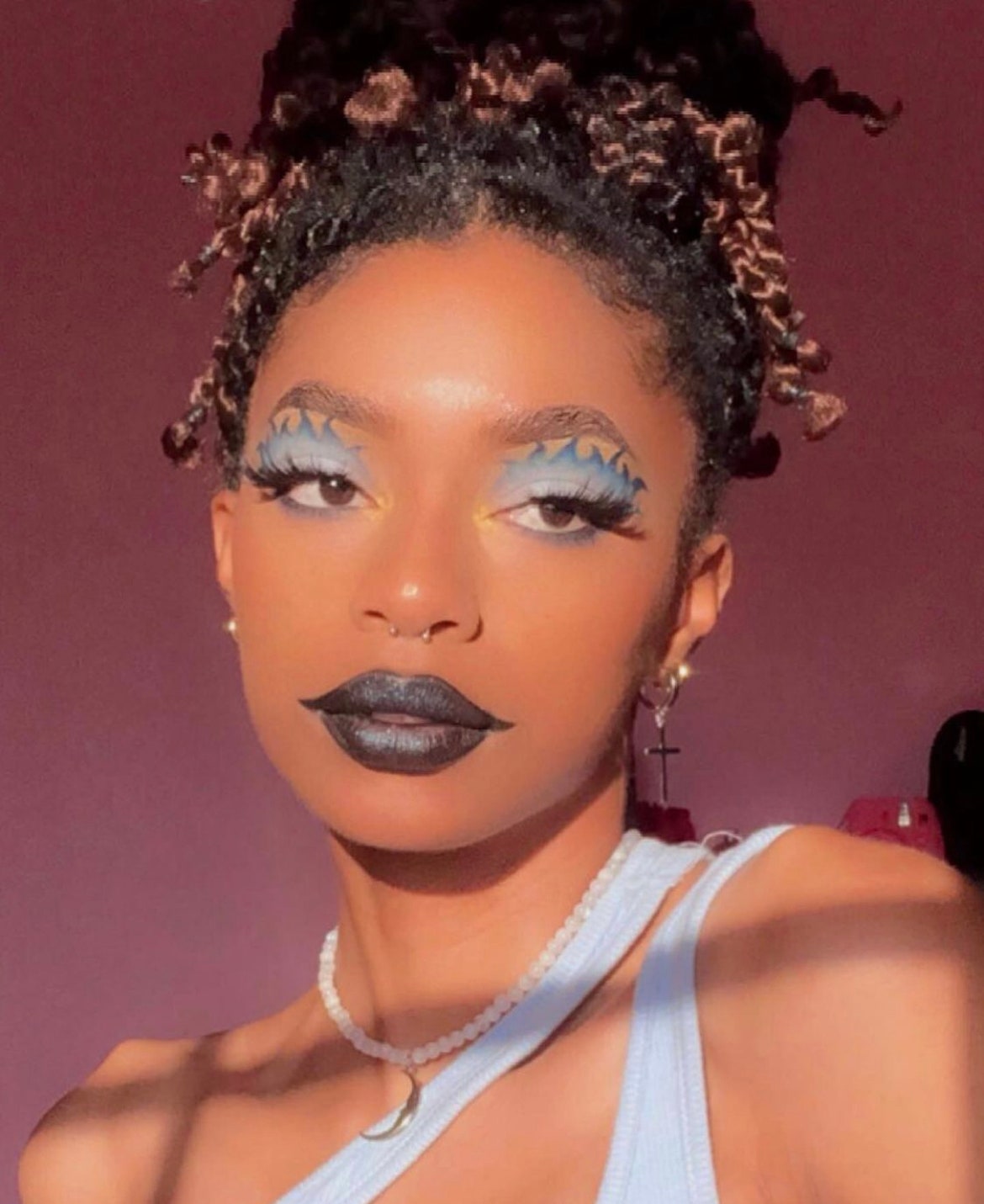 Black girl wearing Hades Halloween makeup