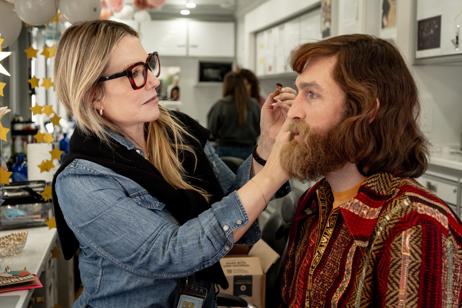 nicholas braun in hair and makeup for saturday night