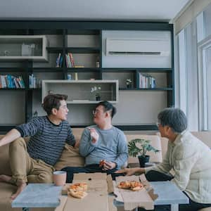 Family having lunch in the living room