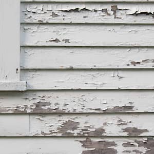 Peeling white paint on siding