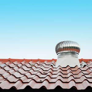 Roof vent on a red roof