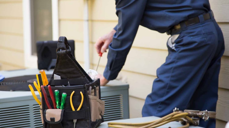 Technician with his tools outside 