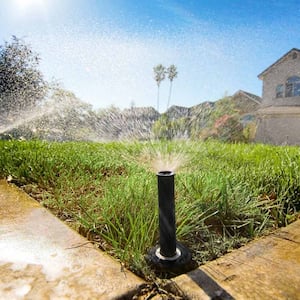 sprinklers watering front law