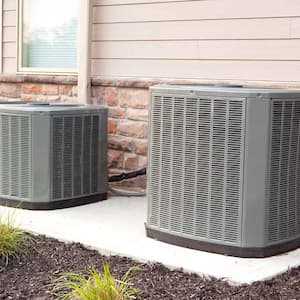 New air conditioner units on a concrete slab 