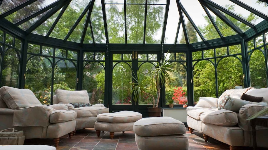 A beautiful solarium with beige furniture