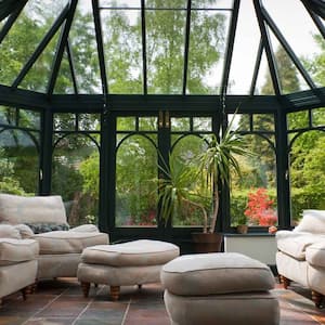 A beautiful solarium with beige furniture