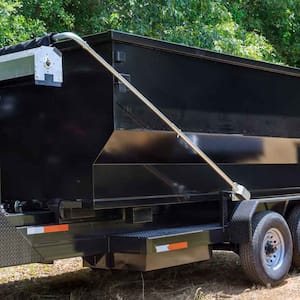 A black dump trailer