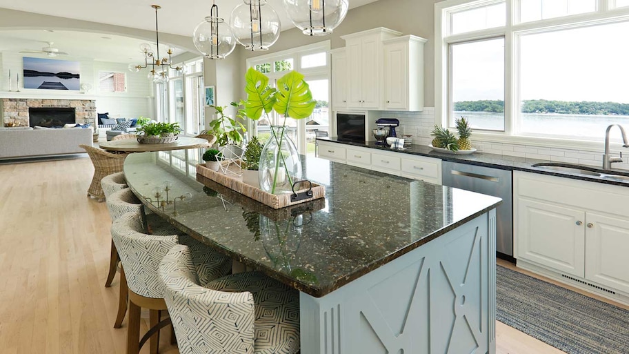 Open plan kitchen with black granite countertops