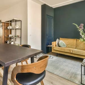 living room with dark blue accent wall