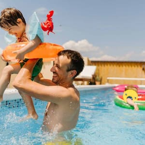 little boy having fun with his father