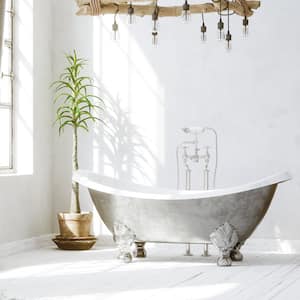 A bright bathroom with a vintage bathtub and plants