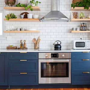 A bright kitchen with subway tiles