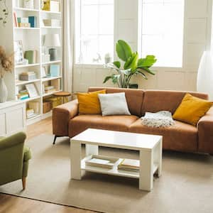 A bulky leather sofa in a living room