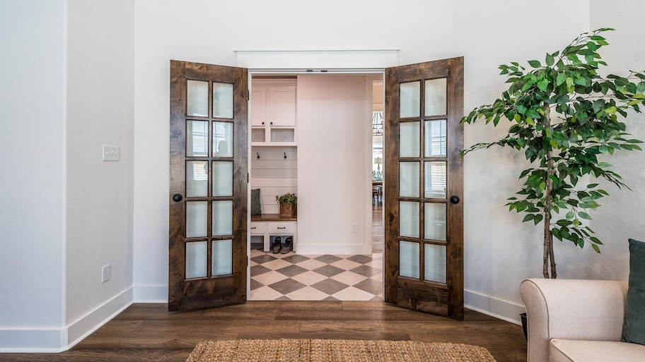 Double doors leading to mudroom