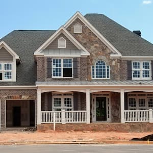 A construction site on the exterior of a house