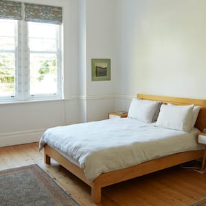 Interior of a cosy bedroom on a sunny day