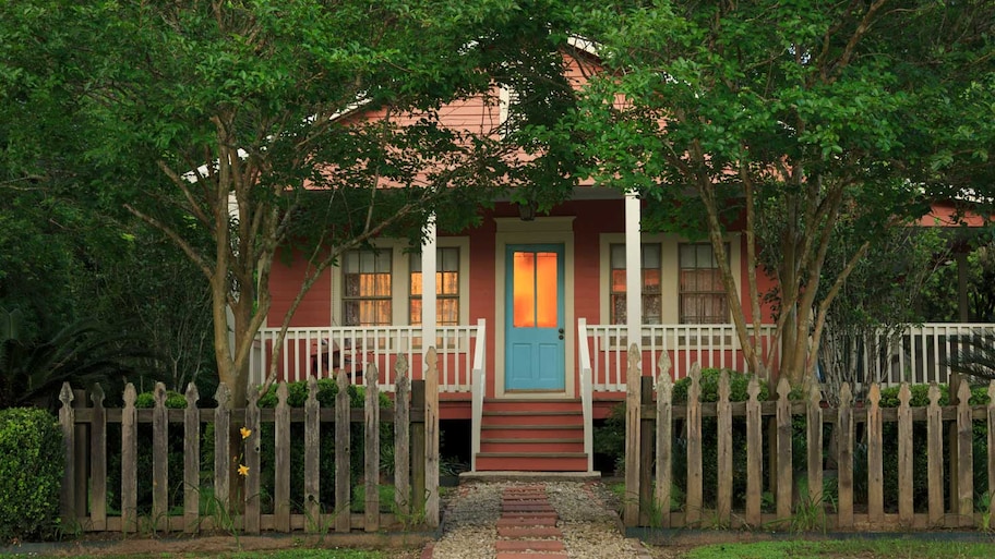 Exterior shot of a cottage house at dusk