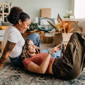 Couple laying in boho living room