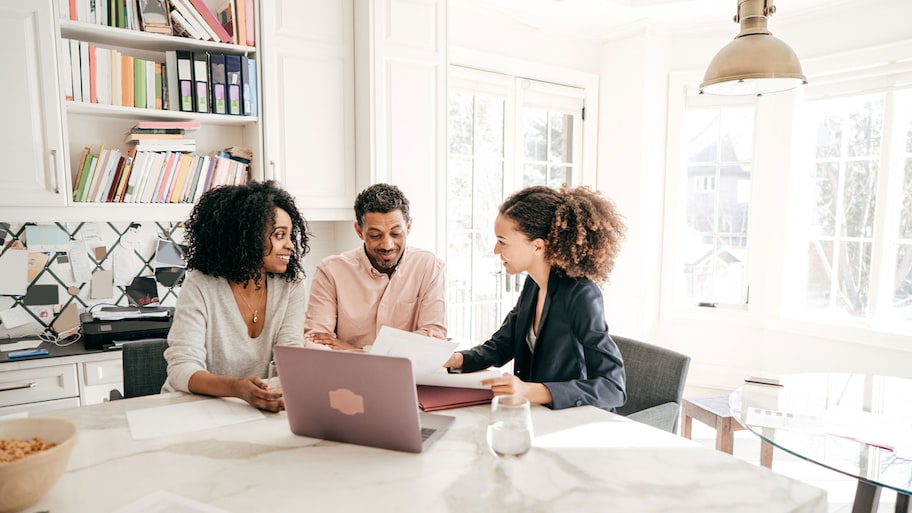 Couple meeting at the office with real estate agent