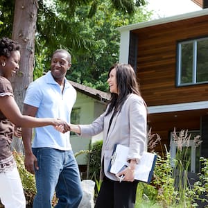 Couple meeting a real estate agent