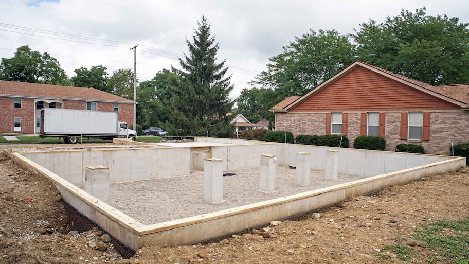 A crawl space foundation with support beams