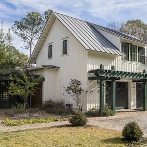 The exterior of a house with a garage turned into living space