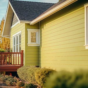 The exterior of a house with vinyl siding