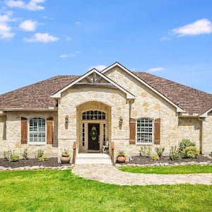 The exterior of a stone house 