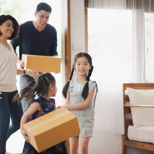 A family of four moving in a new house