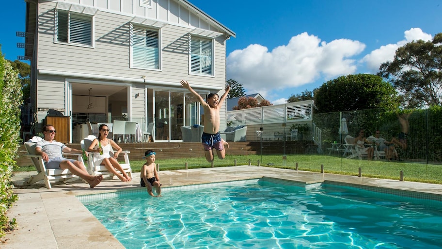 A family having fun in the swimming pool