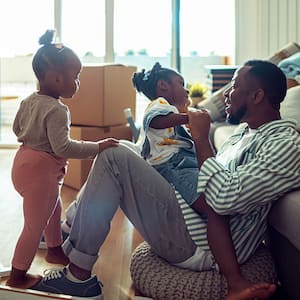 A family and moving boxes at home