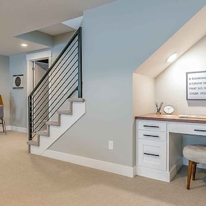 Basement room with office desk