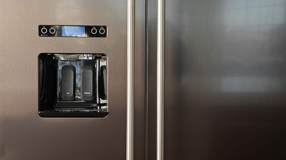 water dispenser and ice maker on fridge